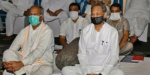 Rajasthan CM Ashok Gehlot during ‘Save Democracy-Save Constitution’ protest, at a hotel in Jaipur on Monday. (Photo | PTI)
