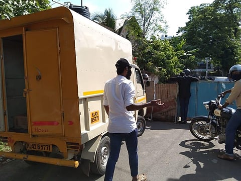 A FMCG truck parked in front of the containment zone