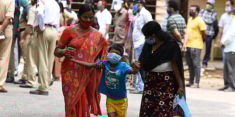 A family arrives at the Sarojini Devi Hospital's sample collection centre to get tested for COVID-19, in Hyderabad on Thursday. (Photo| RVK Rao, EPS)