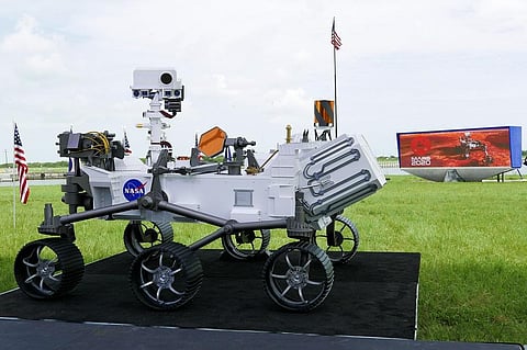 A replica of the Mars rover Perseverance is displayed outside the press site before a news conference at the Kennedy Space Center Wednesday, July 29, 2020, in Cape Canaveral. (Photo | AFP)