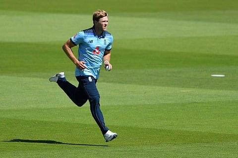 England's David Willey runs in to bowl against Ireland during the first One Day International cricket match. (Photo | AFP)