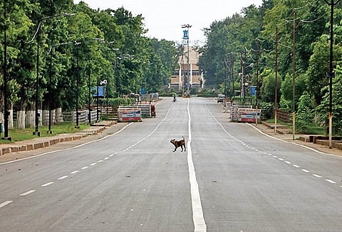Mahatma Gandhi Marg wears a deserted look during the weekend shutdown in Bhubaneswar on Saturday  I express