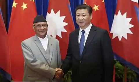 Chinese President Xi Jinping with Nepalese Prime Minister K.P. Sharma Oli (Photo | AFP)