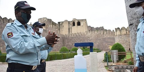 Security guards at the Golconda Fort are well equipped with masks and hand sanitisers to remain safe during this ongoing pandemic. (Photo | S Senbagapandiyan, EPS)