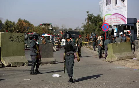 Afghan police inspect at the site of suicide attack near the Afghan Defense Ministry in Kabul (Photo| AP)