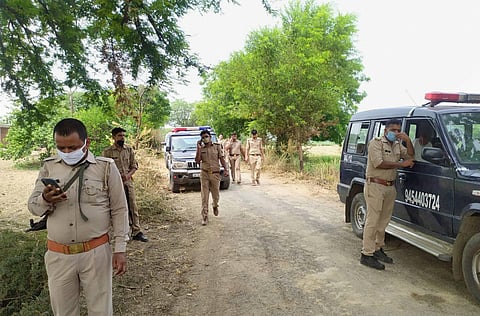 Police team investigates the site of encounter, where 8 police personnel lost their lives after being fired upon by criminals, in Kanpur, Friday, July 3, 2020. (Photo | PTI)