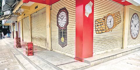 With Covid-19 cases spiking, shopkeepers on Ullal Main Road have voluntarily downed their shutters in Bengaluru on Tuesday | Vinod kumar t