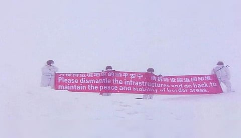 Chinese Patrolling Party appeared with a large red banner asking Indian side to dismantle its infrastructure and to leave the place. (Photo| EPS)