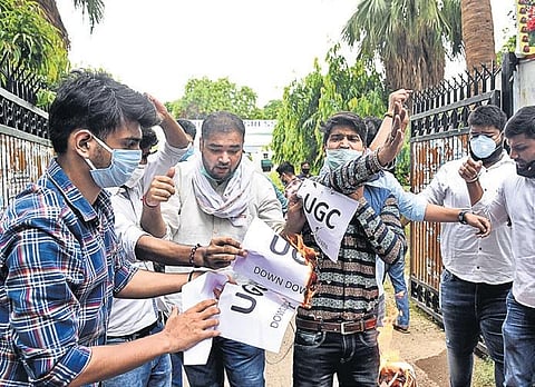 NSUI members protest outside the UGC office against central government’s decision to conduct online exams for DU’s final-year students. (Photo | Parveen Negi, EPS)