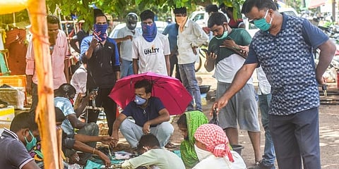Unit-4 daily market reopened after 15days in Bhubaneswar on Friday. (Photo | Biswanath Swain, EPS)