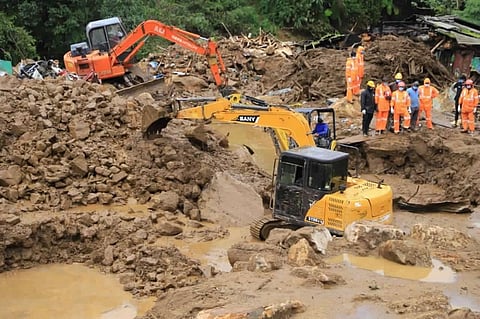 Fire fighters and NDRF teams are conducting a search operation at Pettimudi near Rajamala in Munnar. (Photo | EPS)