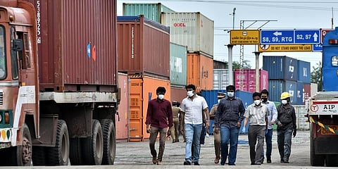 Officials from customs pollution control board and petroleum and explosives safety organisation inspect the containers with ammonium nitrate at Chennai customs warehouse. (Photo | P Jawahar, EPS)