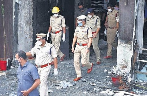 DGP Gautam Sawang visits Swarna Palace Hotel after the fire incident in Vijayawada on Sunday (Photo | Prasant Madugula, EPS)