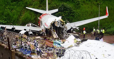 The crashed Air India Express flight at the Karipur International Airport. (Photo | Manu R Mavelil, EPS)