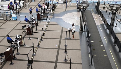 Air travel is down sharply during the pandemic, but airport screeners are finding guns at a much higher rate. (Photo | AP)