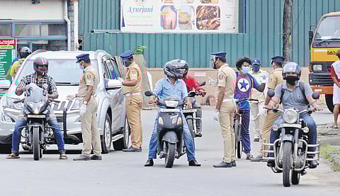 Police officials inspecting vehicles at Thoppumpady | file pic
