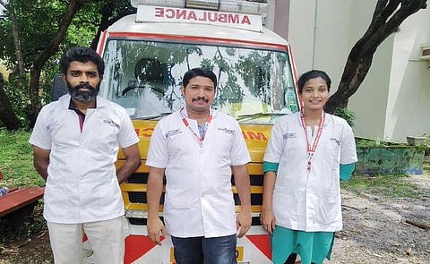The ambulance staff who carried out the delivery of a Covid positive woman. (Photo | Twitter/ANI)