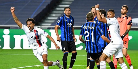 PSG's Marquinhos celebrates after scoring his team's first goal during the Champions League quarterfinal match against Atalanta at Luz stadium, Lisbon, Portugal. (Photo | AP)