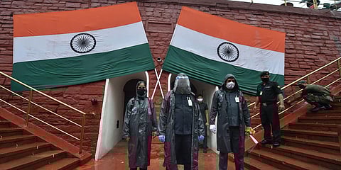 Security personnel stand guardduring the full dress rehearsals for the 74th Independence Day celebrations at Red Fort. (Photo| PTI)