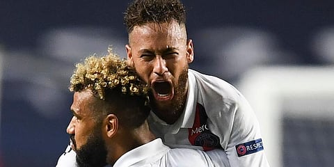 PSG's Neymar celebrates with teammate Eric Maxim Choupo-Moting after his team's Champions League quarterfinal win against Atalanta. (Photo | AP)