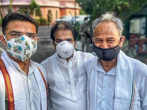 Rajasthan Chief Minister Ashok Gehlot (R), Congress leaders Sachin Pilot (L) and KC Venugopal pose for a photograph in Jaipur. (Photo | PTI)