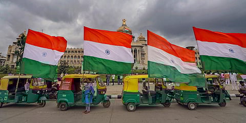 Tricolours on autorickshaws on the occasion of 74th Independence Day in Bengaluru. (Photo| PTI)