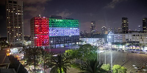 The Tel Aviv City Hall in Israel is lit up with the flag of the United Arab Emirates asboth nations announced they would be establishing full diplomatic ties. (Photo| AP)