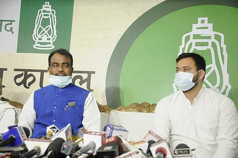 Shyam Rajak with RJD leader Tejashwi Yadav (Photo | Ranjit K Dey)