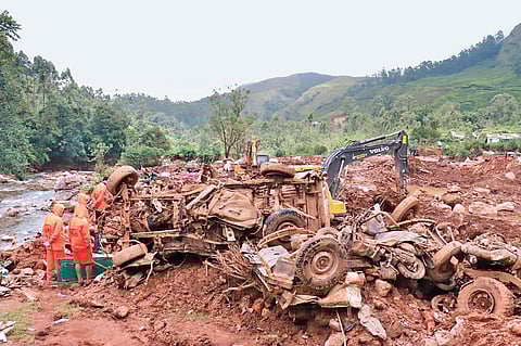 Search for missing persons progressing at the landslide site at Pettimudi in Rajamala near Munnar | Express