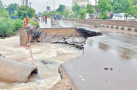 A portion of 100 Feet Road in Warangal gets washed away