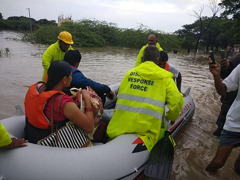 DRF teams rescuing citizens in inundated localities of Warangal