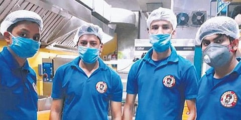 Employees at Burger Singh