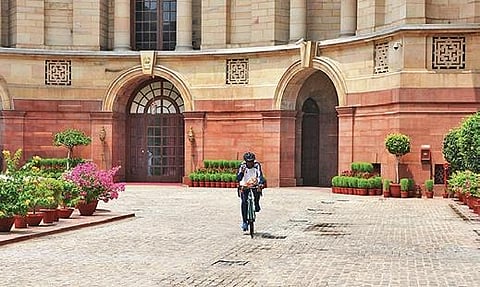 Ali trying out his bicycle at the Rashtrapati Bhavan