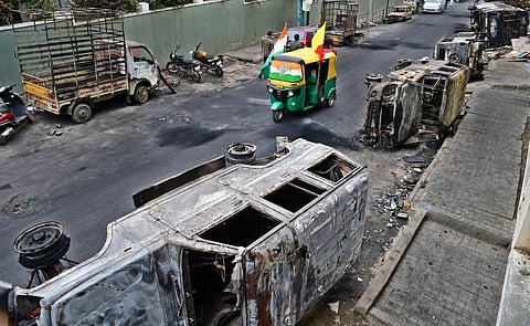 Vehicles vandalised by a mob over a social media post allegedly by a relative of a Congress MLA in Bengaluru. (Photo | Shriram BN, EPS)