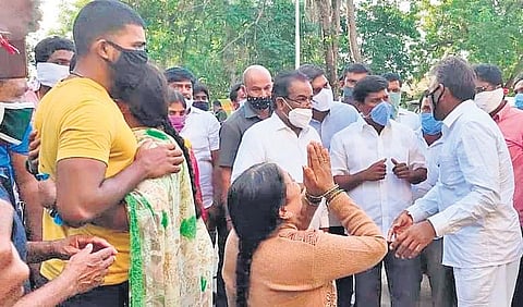Achampet MLA Guvvala Balraj interacts with the relatives of those who died in a fire that broke out at the Srisailam plant.