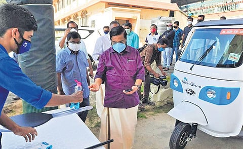 Industries Minister E P Jayarajan flagging off 15 e-autos in Thiruvananthapuram
