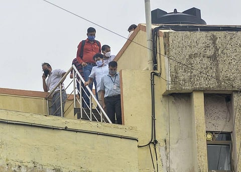 CBI team with Central Forensic Science Laboratory experts during their probe at late Bollywood actor Sushant Singh Rajput's residence at Bandra in Mumbai Saturday Aug 22 2020. (Photo | PTI)