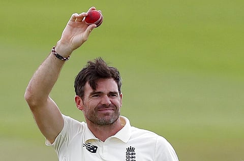 England's James Anderson holds up the ball to celebrate his 600th Test wicket. (Photo | AP)