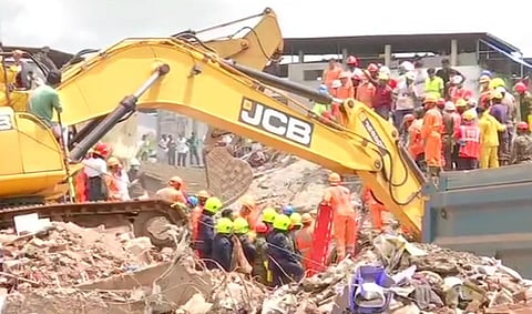 Maharashtra: National Disaster Response Force continues rescue operations at the site of building collapse in Raigad. (Photo | ANI)
