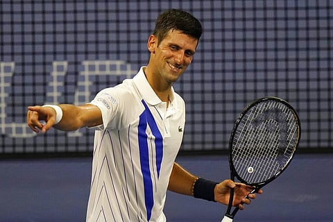 Novak Djokovic, of Serbia, reacts to winning his match over Ricardas Berankis, of Lithuania, during the second round at the Western & Southern Open tennis tournament. (Photo | AP)