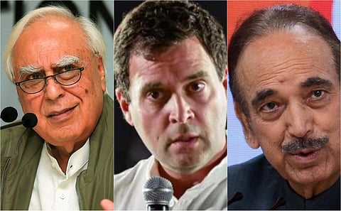 Kapil Sibal (L), Rahul Gandhi (Centre), Ghulam Nabi Azad (R)
