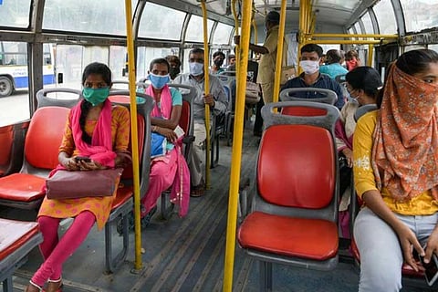 Commuters travelling in a bus amid the coronavirus pandemic. (File Photo | EPS)
