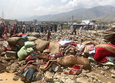 Afghans rescue people after heavy flooding in an area in the Parwan province, Afghanistan, Wednesday, Aug. 26, 2020. (Photo | AP)