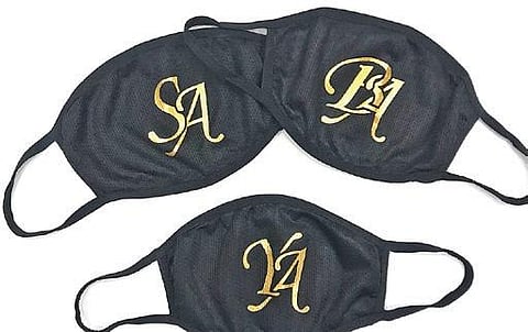 From bags it was a natural progression to similarly personalised belts and monogrammed face masks