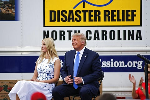 President Donald Trump, right, sits with his daughter Ivanka Trump. (Photo | AP)
