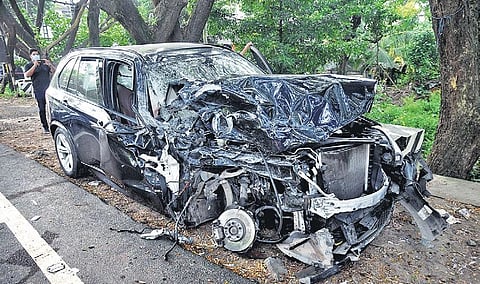 The mangled remains of the car that rammed the Army truck