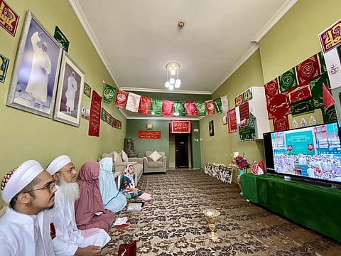 Community members have decorated their homes with handmade banners and flags.(Photo| EPS)