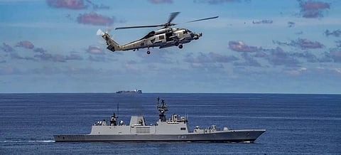 Indian naval ship conducts a Passage Exercise PASSEX with the United States Navy's USS Nimitz carrier strike group as it transits the Indian Ocean. (Photo | Twitter)