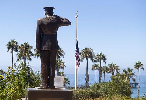 The U.S. flag was lowered to half-staff at Park Semper Fi in San Clemente, California. (Photo | AP)