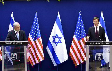 Israeli PM Benjamin Netanyahu, left, and White House adviser Jared Kushner make joint statements to the press about the Israeli-United Arab Emirates peace accords, in Jerusalem. (Photo | AP)